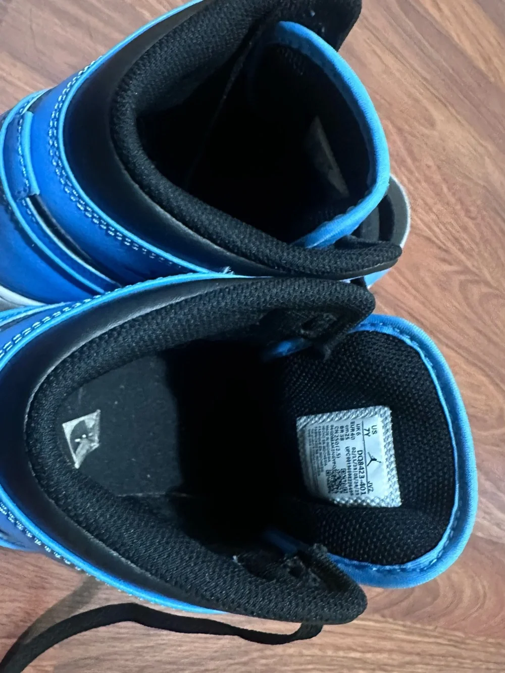 Jordan Youths Light Blue and Black High-Top Sneakers